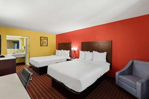 Postel nebo postele na pokoji v ubytování SureStay by Best Western Gulfport