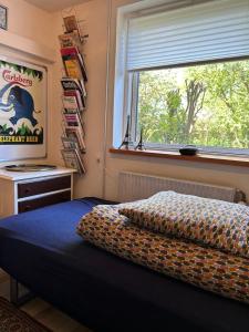 GETGYR Hostel客房内的一张或多张床位