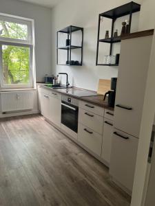 Η κουζίνα ή μικρή κουζίνα στο Wohnen im Leipziger Süden