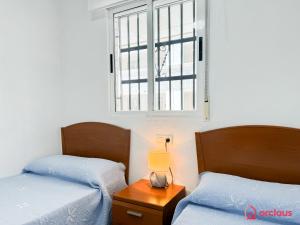 Postel nebo postele na pokoji v ubytování Un Flamante Hogar