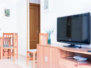 TV a/nebo společenská místnost v ubytování Un Flamante Hogar