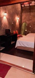 A bed or beds in a room at Sriyantha Rest