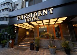 a hotel with a sign that reads president hotel at The President Hotel Cairo in Cairo