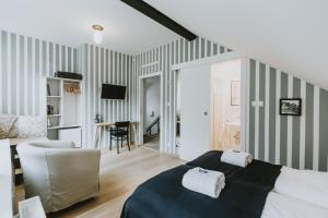 A bed or beds in a room at Villa Mimi