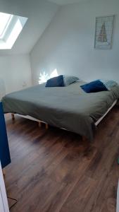 Ένα ή περισσότερα κρεβάτια σε δωμάτιο στο Duplex Cosy 100m2 Terrasse Fouesnant Les Glénan
