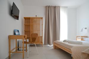 TV a/nebo společenská místnost v ubytování B&B Dreaming