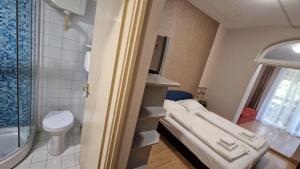 Kúpeľňa v ubytovaní Piknik Wellness Hotel