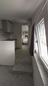 Η κουζίνα ή μικρή κουζίνα στο Gialì House +10 φωτογραφίες