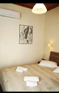 Postel nebo postele na pokoji v ubytování Guesthouse Corali