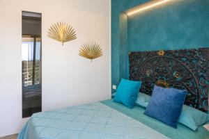 Postel nebo postele na pokoji v ubytování ROTAREDDU B&B
