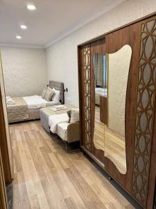 Un pat sau paturi într-o cameră la Angels Garden Hotel - Grand Bazaar