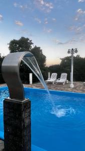 A piscina localizada em Pousada 3 Corações Penedo ou nos arredores