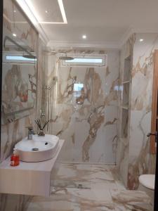Ванна кімната в Appartement de Luxe Arena Martil