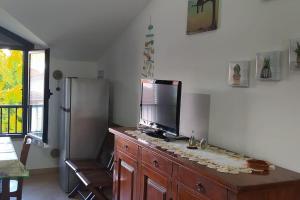 Kuchyň nebo kuchyňský kout v ubytování Mansarda a 200 mt. dal mare