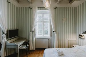 A bed or beds in a room at Villa Mimi
