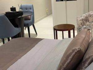 Et opholdsområde på Homes2Retreat - Chic Studio in Damac Uppercrest