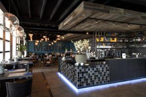 Lounge nebo bar v ubytování Vakantiepark Eiland van Maurik