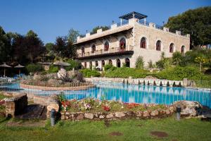Bazén v ubytování Hotel Doña Teresa nebo v jeho okolí