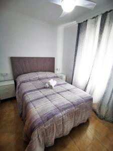 Voodi või voodid majutusasutuse Apartamento Completo Luna Llena de Barbate toas