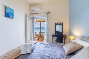 Φωτογραφία από το άλμπουμ του Nikos Seaside Apartment στην Αγία Πελαγία Χλωμού