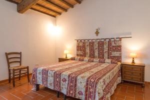 ポマランチェにあるSanta Lina - Gelsominoのベッドルーム1室(ベッド1台、テーブル2台、椅子付) +32枚の写真