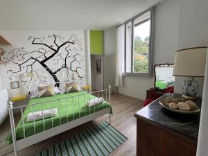 Postel nebo postele na pokoji v ubytování Villa Rossini