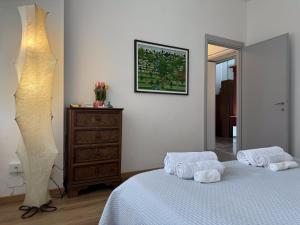 Postel nebo postele na pokoji v ubytování Villa Rossini