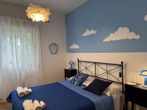 Postel nebo postele na pokoji v ubytování Villa Rossini