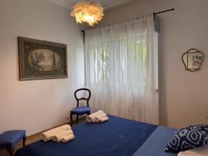 Postel nebo postele na pokoji v ubytování Villa Rossini