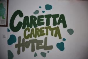 Ett certifikat, pris eller annat dokument som visas upp på Caretta Caretta Hotel
