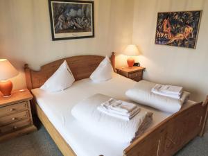 Postel nebo postele na pokoji v ubytování Apartment Apt B 032 by Interhome