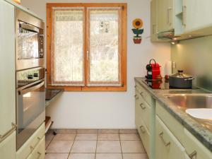 Kuchyň nebo kuchyňský kout v ubytování Apartment Belmi by Interhome