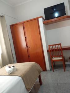 Voodi või voodid majutusasutuse Mariachis Hotel toas