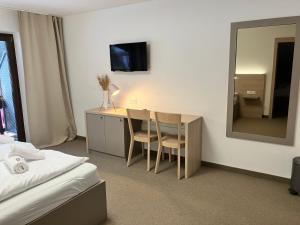 Postel nebo postele na pokoji v ubytování Hotel Stubnerhof