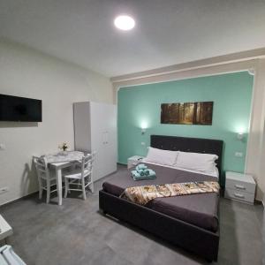 Postel nebo postele na pokoji v ubytování ACRONE GUEST HOUSE Centro Città (Locazione Turistica)