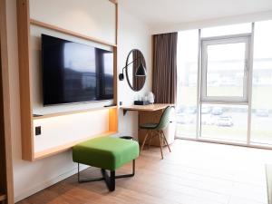 Hilton Garden Inn Faroe Islands TV 또는 엔터테인먼트 센터