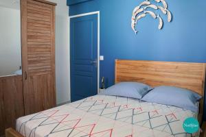Postel nebo postele na pokoji v ubytování Villa Noëlyne + 18 fotografií