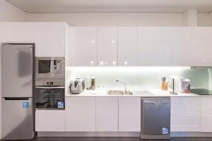 Køkken eller tekøkken på GuestReady - Fantástico apt em Santa Catarina