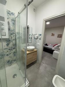 Koupelna v ubytování ACRONE GUEST HOUSE Centro Città (Locazione Turistica)