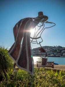 a glass sculpture of a bird on a beach at Waterfront House in Dartmouth