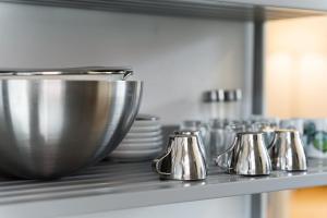 A cozinha ou kitchenette de GuestReady - Modern Duplex, Neo-Classical Building