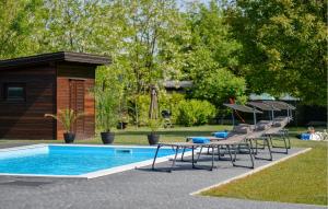 The swimming pool at or close to Gorgeous Home In Puscine With Sauna
