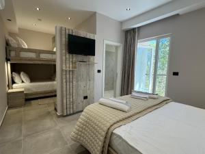 Postel nebo postele na pokoji v ubytování Hotel Kseal