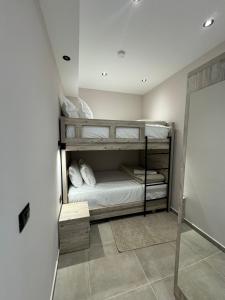 Postel nebo postele na pokoji v ubytování Hotel Kseal