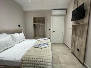Postel nebo postele na pokoji v ubytování Hotel Kseal