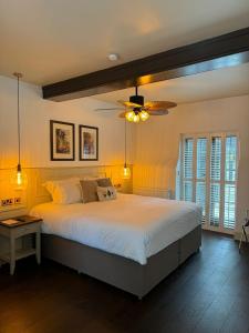 Katil atau katil-katil dalam bilik di Woolpack Inn