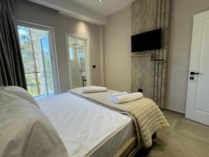 Postel nebo postele na pokoji v ubytování Hotel Kseal