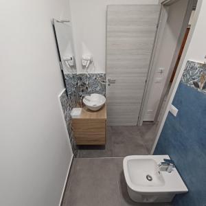 Koupelna v ubytování ACRONE GUEST HOUSE Centro Città (Locazione Turistica)