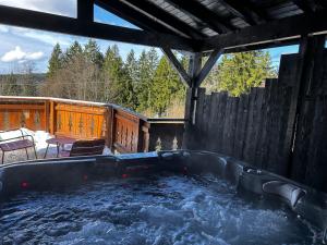 Foto sihtkohas Belfahy asuva majutusasutuse Chalet avec jacuzzi privé, vue sur les Vosges galeriist