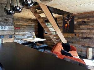 Istumisnurk majutusasutuses Chalet avec jacuzzi privé, vue sur les Vosges